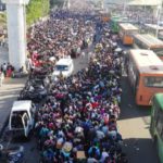 migrant-workers-and-their-family-members-lineup-outsdie-the-anand-vihar-bus-terminal-to-leave-for-th-1585415071-9664