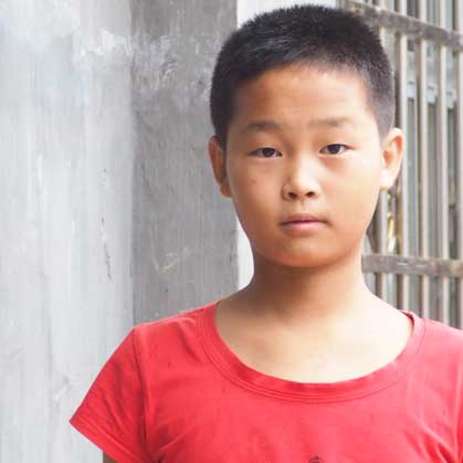 Boy from China in red T shirt