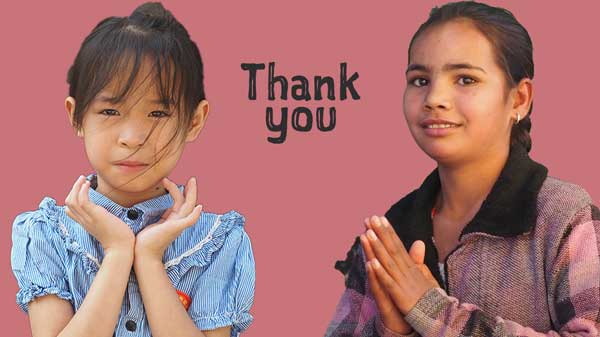 2 girls saying Thank you from Heart for Kids