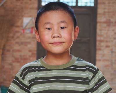 Boy living in a village in China