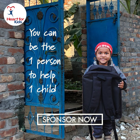 Child in India with school bag