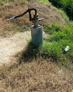 old village water pump - unsafe