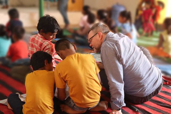 children being helped