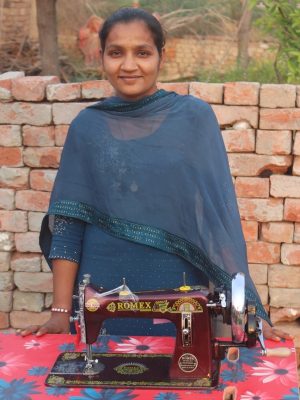Indian woman with sewing machine